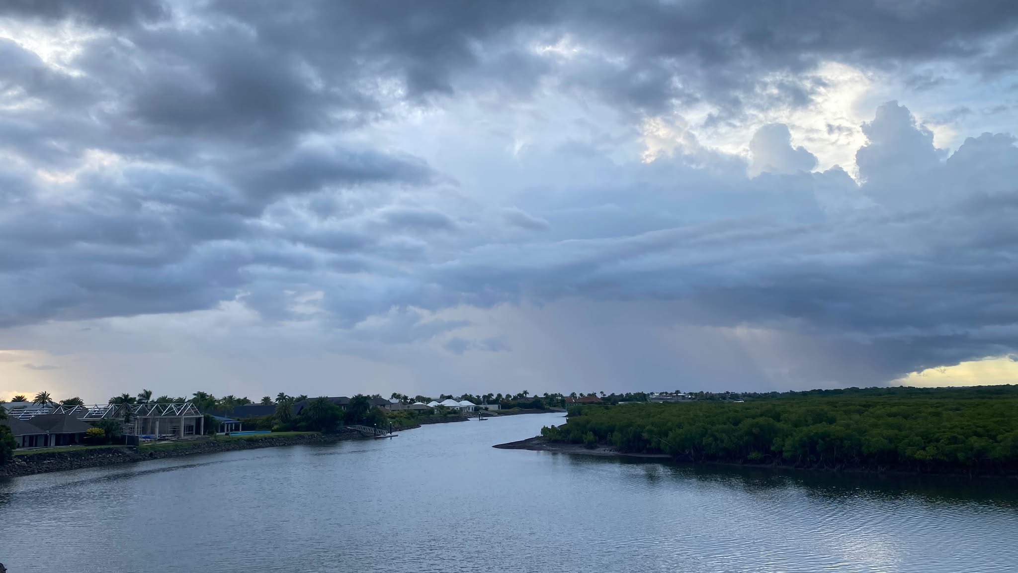 The coastal waterway beneath an evening sky